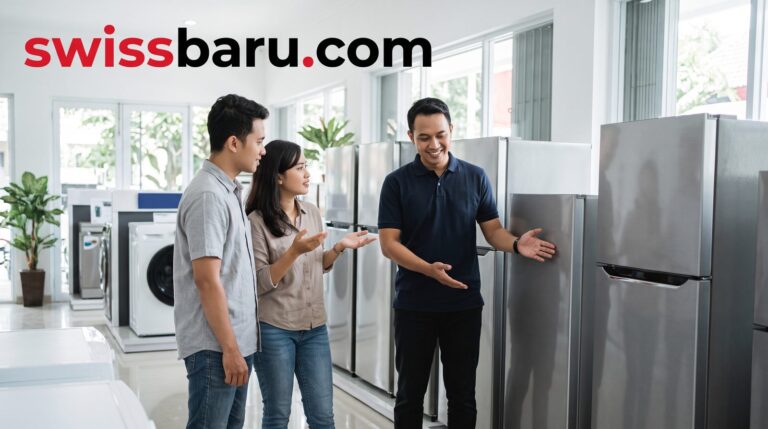 Pasangan dan staf toko melihat deretan kulkas di showroom toko kulkas Manado